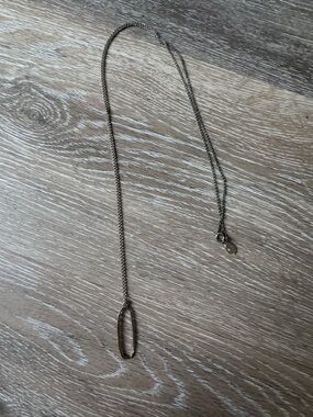 LOFT bar rhinestone necklace on a long silver toned chain